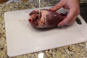 Remove the top of the deer heart